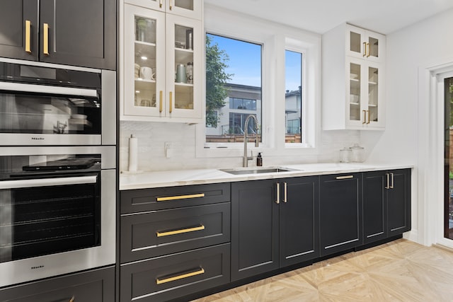 black kitchen with brown handles