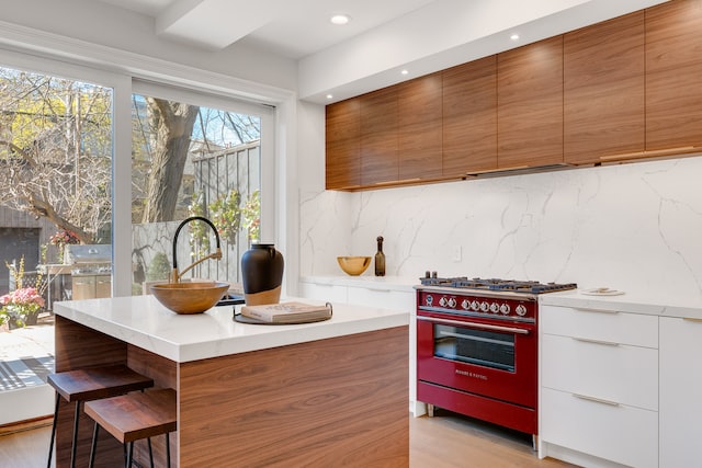 brown and white kitchen with island