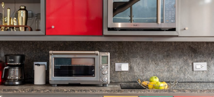 grey microwave in the colorful kitchen