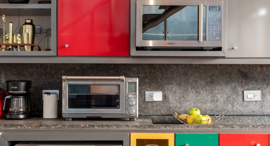 grey microwave in the colorful kitchen