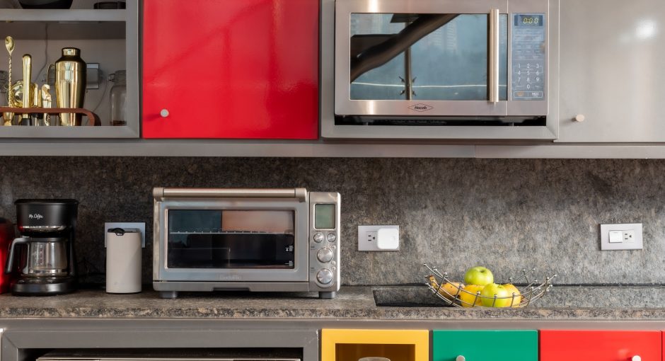 grey microwave in the colorful kitchen