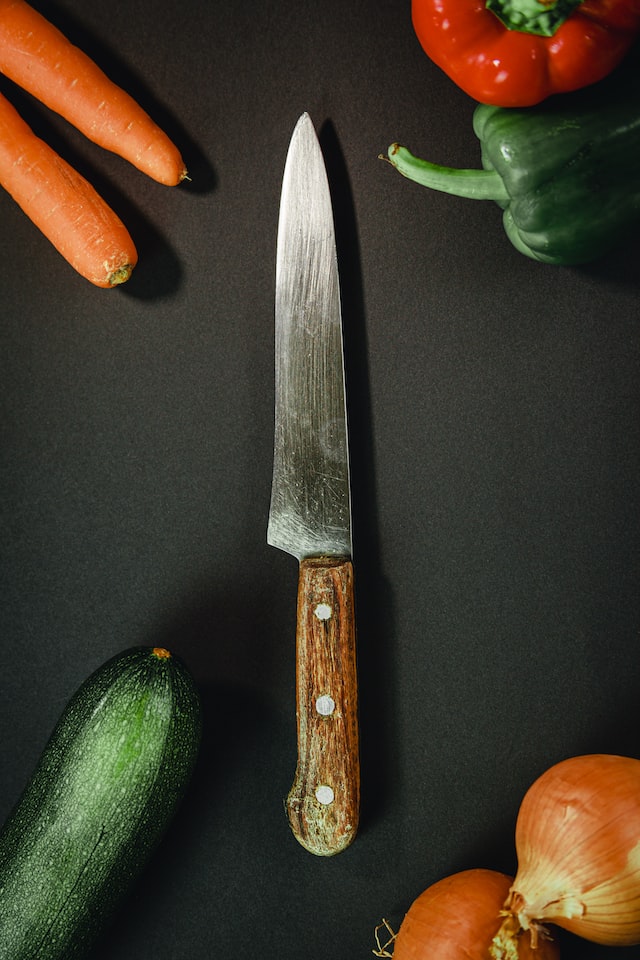 kitchen knife with vegetables