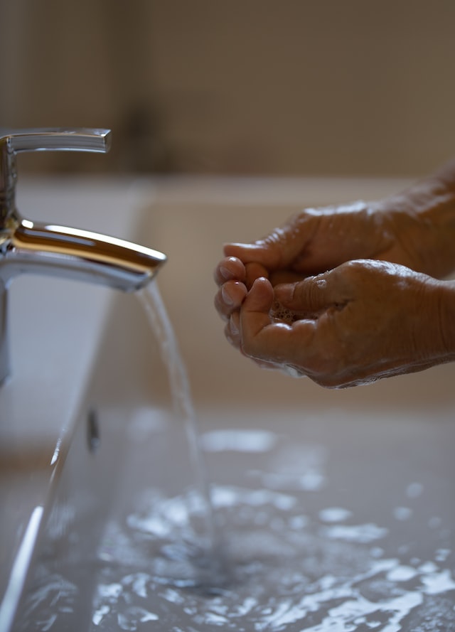 person washing hands