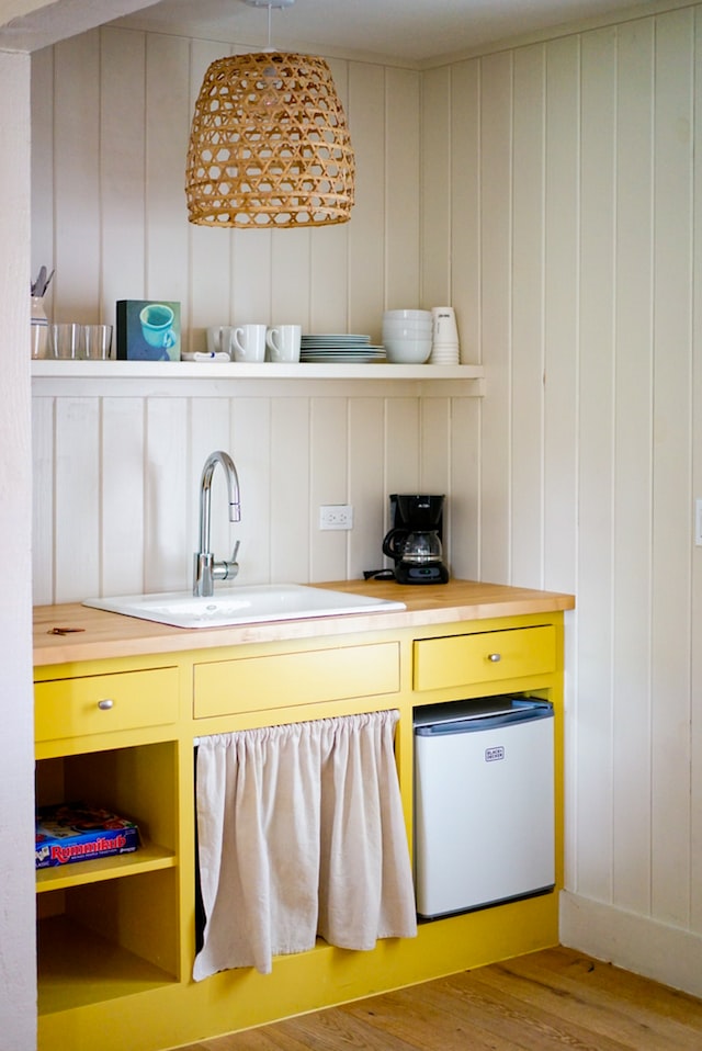 small yellow kitchen