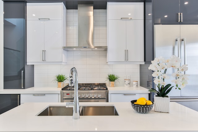 stainless faucet on the kitchen island