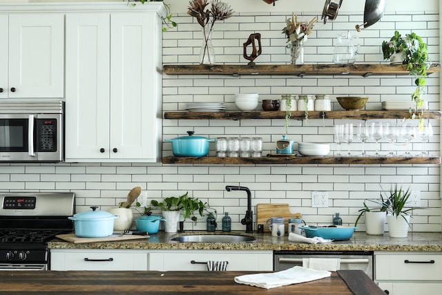 white and brown kitchen with a lot of equipment